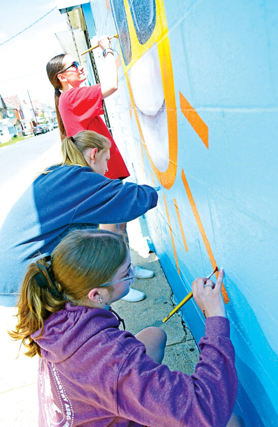 Bright prospects: Altoona High School students design, paint logo mural ...